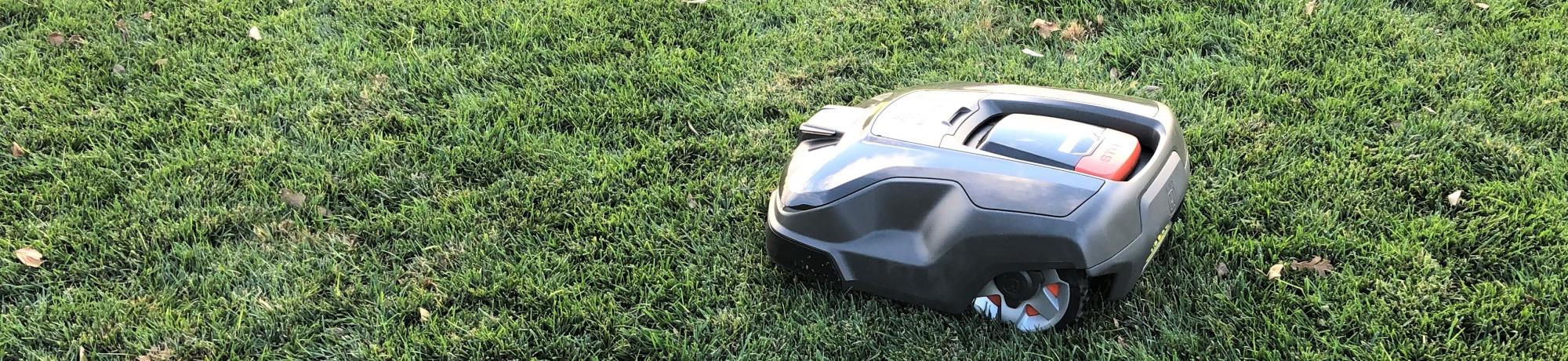 A 315X Husqvarna Automower trims one of the cool season plots at SmartLawn